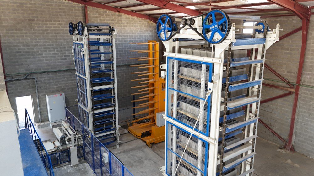 Automated rack transfer and stacking system